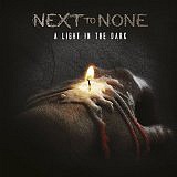 NEXT TO NONE - A light in the dark